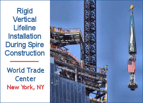 Vertical rigid fixed-track lifelines installation during spire construction, World Trade Center, New York.