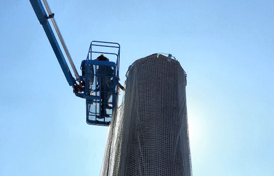 Custom Attachment Brackets For Debris Containment Netting on Old Police Barracks Incinerator Smokestack, East Orange, NJ