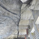 Combined Personnel and Debris Containment Netting With Inlaid Mesh Liner