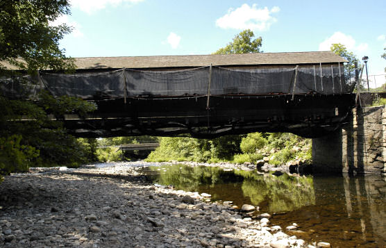 Fine Mesh Debris Nets Used During Historic Covered Bridge Rehabilitation