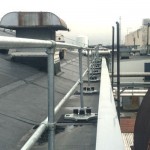 Custom engineered modular rooftop railings on multi-level roof for Fortune 500 defense contractor.