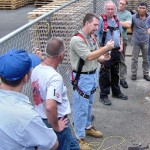 Demonstration of proper use of horizontal cable lifelines.