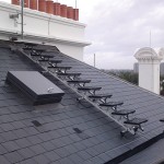 Kee Walk non-slip OSHA-compliant non-penetrating roof walkway installations for safe rooftop access.