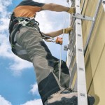 Vertical Cable Lifelines On Ladder To University or College Water Tower